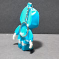 Load image into Gallery viewer, 3D Printed Hooded Bone Flexi Keychain or Ornament
