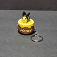 Load image into Gallery viewer, 3D Printed Bee in a Honey Pot Fidget Clicker Keychain
